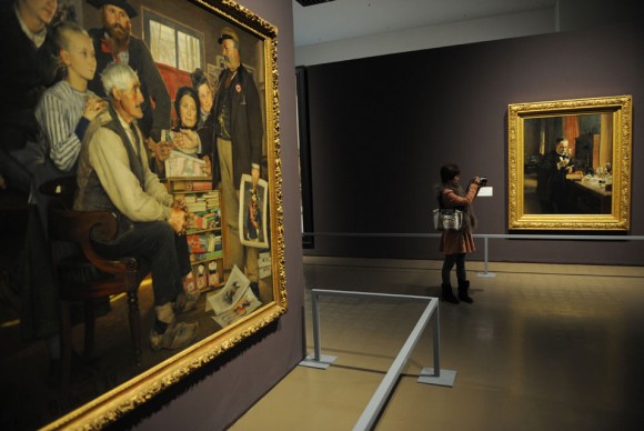 A journalist takes photos of art work at a press preview of a major exhibition from Frances Musee dOrsay 580x388 Frances Musee dOrsay opens major show of 19th century paintings at new museum in China